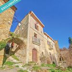 Spacieuse maison avec cave et terrasse offrant un superbe panorama