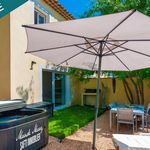 Maison mitoyenne par un côté de 55 m2 - 2 chambres - jardin et 2 places de parking privatives