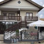 Detached two-storey house, with a large yard with parking for five cars