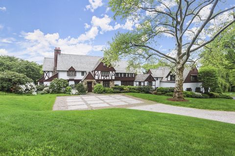 Belle Haven Peninsula -Exquisite architectural details combined with modern updates characterize this charming six-bedroom English Manor set back on 1.35 acres in the Belle Haven neighborhood. Meticulously maintained 1929 home boasts thoughtful 2004 ...