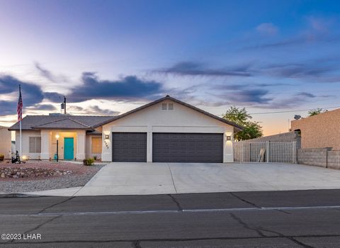 Welcome to your dream Havasu oasis! This stunning 3-bedroom, 2-bathroom home offers the perfect blend of modern comfort and outdoor luxury. From the moment you step inside, you'll be captivated by how well it has been maintained and the thoughtful fe...