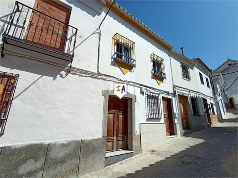 This 2 bedroom 2 bathroom townhouse is located in Baena, in the province of Cordoba in Andalucia, Spain. The property is made up of 2 floors, a patio and a roof terrace. The main door opens to a tiled hall that leads to the living room with feature f...