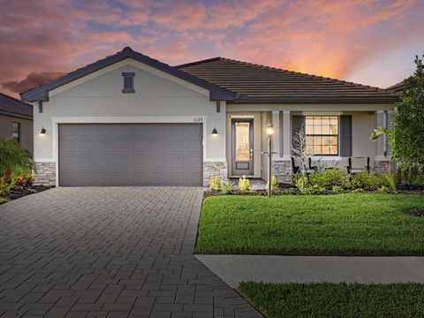 MOVE IN READY!!!! Lorraine Lakes in the heart of Lakewood Ranch is a brand-new MAINTENANCE FREE, GUARD GATED community with more AMENITIES than you can dream of. This newly built pristine VENICE model is 1,849 square foot single level split floor pla...