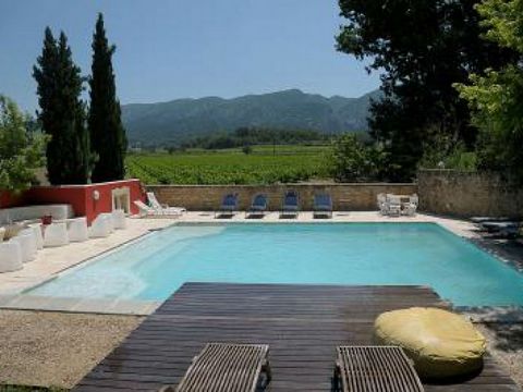 Provence villa rental. In the heart of Luberon, 10km from Gordes, splendid nineteenth century bastide shaded by magnificent trees in the middle of vineyards. The house is large and comfortable, decorated with taste, humor and poetry. Resolutely place...