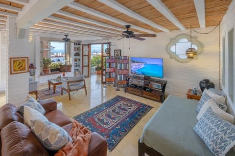 Condominium for Sale in Centro Puerto Vallarta Jalisco Lovely and spacious 1 bedroom 1 bath open floor plan unit in downtown Puerto Vallarta. This unit has ocean and city views from the living room and side terrace. Located in an 8 unit boutique buil...