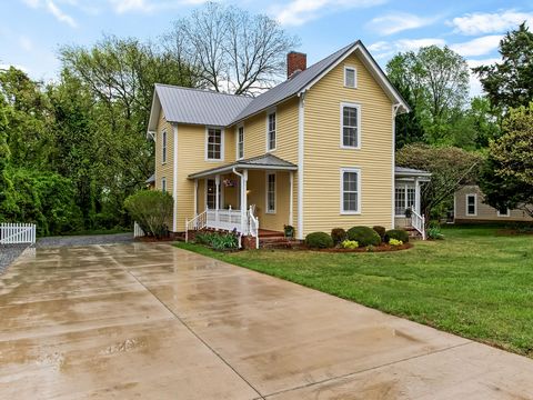 This charming home built in 1900, is ideally located a very short distance from downtown Cornelius with shopping, dining, and the Cain Center for the Arts! Featuring multiple covered rocking chair porches, period wood floors, 9.5-foot ceilings on the...