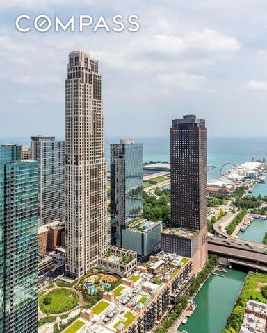 Welcome to sheer luxury at 4702, a meticulously designed 3-bedroom, 2.1-bath dream home perched on the 47th floor of Chicago's coveted, amenity-rich condominium, One Bennett Park. This architectural gem, conceived by the illustrious Robert A. M. Ster...