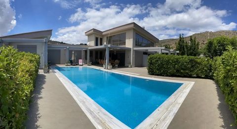 Villa for Sale 420sq.m in Lavrio. Built in 2012. Plot of land 5000sq.m. Consists of 5 bright and airy bedrooms, 4 bathrooms, 2 modern kitchens, 2 spacious living rooms and storage room available. It is sold furnished. Moreover,it has an indoor stairc...