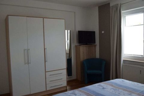 Acogedor apartamento de vacaciones con dos dormitorios, cocina nueva, baño con ducha y jardín propio.