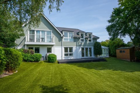 This exquisite 3500sqft New England style property is in one of the areas most desirable locations. Sitting neatly amongst landscaped grounds this beautiful south-west facing property provides seclusion and privacy whilst being within walking distan...