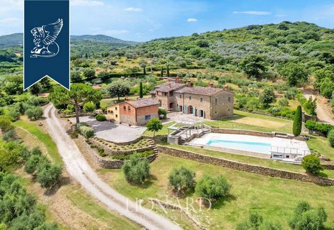 Set in the picturesque hills surrounding Arezzo, this 18th-century farmhouse blends historical charm with modern comforts. Recently renovated, the property maintains its rustic character with exposed beams and stone walls, while incorporating contemp...