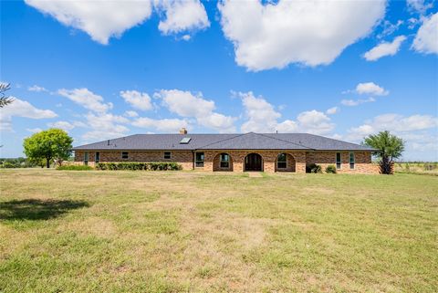 Situated on a breathtaking 2 acre lot, this single story home offers serene and peaceful living. There are many updates throughout include new carpet, new tile flooring, and renovated bathrooms. The primary bath has a stand alone tub and walk in show...