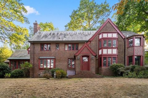 Located in the historic Chestnut Hill Reservoir area, a short distance from Boston College, this classic 1930s brick Tudor-style residence spans almost 4500 square feet. It features 15 rooms, including 6 bedrooms and 4.5 bathrooms, radiating timeless...