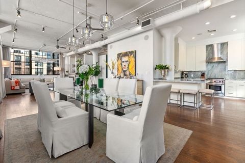 Classic South End loft living meets modern luxury. This residence offers approx. 2,826sf of single level living space featuring 12 ft ceilings and 9 ft tall windows across 4 exposures. The residence features 3 bedrooms and 2 bathrooms including an ov...