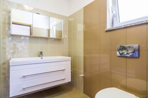 The Cozy One Bedroom Apartment with Terrace in Brsec, located in the Primorje-Gorski Kotar County of Croatia, is an inviting vacation rental that offers a serene getaway. The apartment is well-suited for romantic getaways or solo retreats, offering p...
