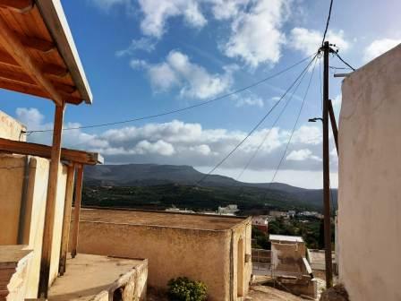 Zakros, Sitia, East Crete: Stone house in need of modernization with garden enjoying mountain and village views. The property is 98m2 on a plot of 240m2 and consist of five rooms out of which one room has a fireplace, plus an outdoor toilet of 4m2. T...