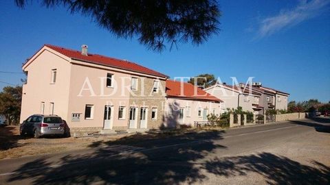 Two apartment houses for sale on the island of Rab - Barbat. Distance from the sea and the beautiful beach is about 150 m. Distance from the city center is about 4 km. Near the houses there are restaurants, shops, supermarket, sports and children&apo...