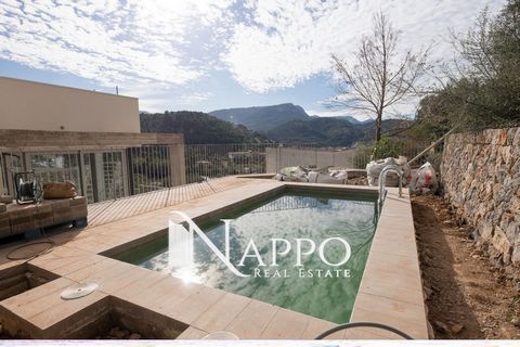 Nappo Real Estate has the opportunity to present this beautiful newly built villa with stunning sea and mountain views located in the port of Soller. This detached house is composed of two floors, panoramic deck, garage, garden and pool in urbanizati...