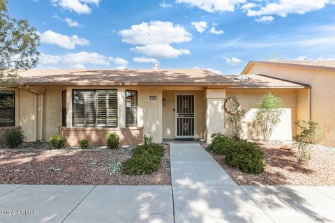 Discover this stunning 1 bed, 1 bath townhouse in the sought-after Fiesta Court Community, boasting 880 sq ft of modern elegance. Enjoy an open floor plan w/ plantation shutters, new wood-look tile floor throughout, & a great room w/ a bay window & v...