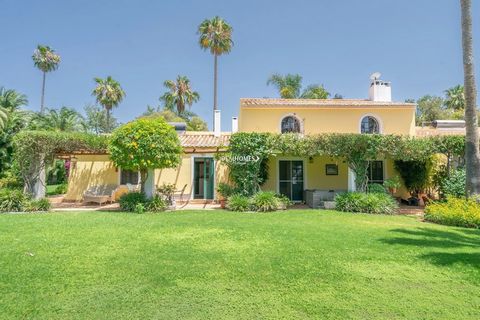 This magnificent seven bedroom villa is situated in the charming town of Mexilhoeira Grande, nestled within a large 35,200m2 plot of land. Immerse yourself in the tranquility of this idyllic setting, adorned with matured, landscaped gardens and offer...