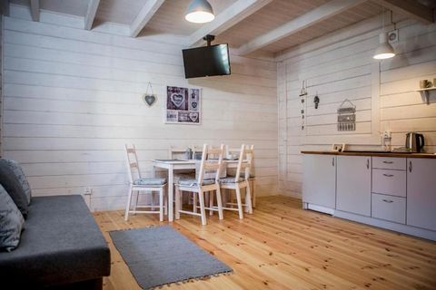 Family, intimate holiday resort in a quiet area, on the outskirts of the resort. Surrounded by forest, in a fenced, safe area. 10 minutes walk to the sea. The town centre with numerous cafes, restaurants, within a few steps. Each cottage has a spacio...