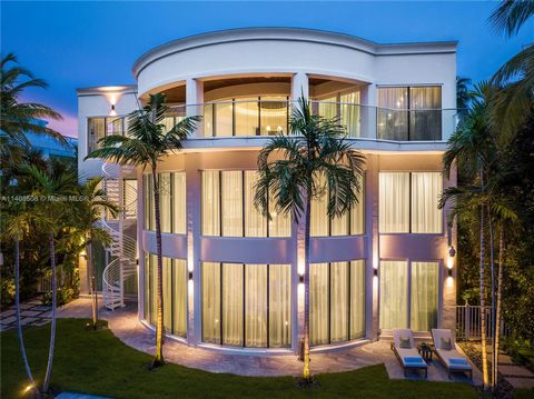 New Neo-Classic, one of a kind, 3 Story waterfront home. Fully Furnished, equipped, and adorned by Argent Design. Open Atrium entry with water features and glass. Stunning Circular glass 30 ft tall center piece staircase with curved hand rail. 15,000...