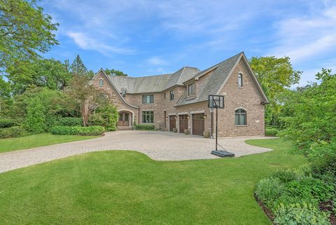 Exquisitely designed, masterfully crafted, and superbly functional is this outstanding Northfield home set on 1 acre of land. All brick and stone exterior with cedar shake roof. The expansive paver brick driveway with gorgeous landscape leads to the ...