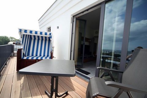 Appartamento attico, balcone, sedia a sdraio, vista mare frontale, sulla spiaggia, sauna, divano letto, cantina propria, parcheggio sotterraneo, WiFi gratuito,