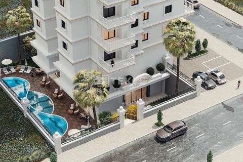 Appartements Vue Mer et Montagne dans un Complexe d'un Seul Bloc à Mahmutlar Alanya Mahmutlar est l'un des quartiers les plus développés d'Alanya avec ses équipements sociaux et ses institutions officielles. Avec sa plage de sable de 5 km, ses restau...