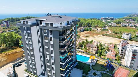 ALANYA/AVSALLAR 900 METER VAN DE ZEE MET UITZICHT OP ZEE 1+1,58 m2,Tuin Binnen- en buitenzwembad Turks stoombad en sauna Jacuzzi - Stoombad Fitness - Bioscoop Tennis-basketbal-banen Kinderpark en pergola Generator- Wi-Fi Camera - 24/7 begeleider KOST...