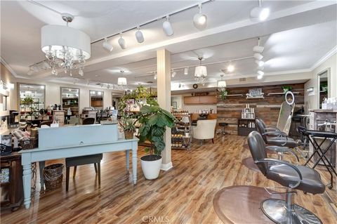 Beautifully Appointed, Modern & Chic Hair Salon with 8 Individual Chair Stations, 2 Sink Bowls, 1 Manicurist Station & Storage Room with 2 Bathrooms. Improvements Include; Wood Paneling, Wood Flooring, Crystal Chandeliers, Decorative Mirrors, Recepti...