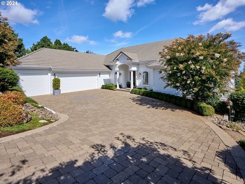 As you walk through the grand arched entry, you'll be greeted by breathtaking territorial views framed by a wall of windows. On clear days, the majestic mountains (Mt. Hood, Mt Jefferson, Mt. St. Helens) will captivate you. Inside, the home is adorne...