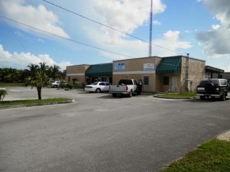 2800 Sq.Ft. Metal Roof Building sitting on 1.38 acres The Main Shop Space has 2 offices 2 bathrooms and a large show room floor and a workshop. Flanked by 2 offices on either side. There are 2 garages in the back of the building and Lots of other ame...