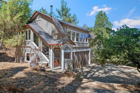 Private and quiet gated property with stunning valley views. Surrounded by nature while still being within 1.6miles of downtown Los Gatos. This property offers two separate living residences that used to be the guest house and carriage home for the G...