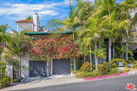 Perched in the Hollywood Hills just above the famed Chateau Marmont, this private 1920s Spanish home has been perfectly restored with charm and character, featuring exquisite finishes, modern amenities and stunning city views. The main level consists...