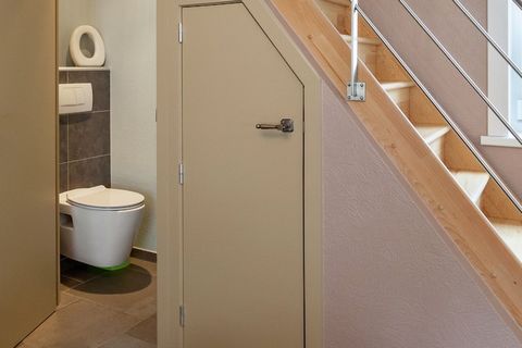 This spacious holiday home in Le Bizet (Comines), Hainaut, comfortably accommodates up to 10 guests, perfect for large families or groups. The ground floor features a living room, kitchen, and a convenient toilet. Upstairs, there are four bedrooms: o...