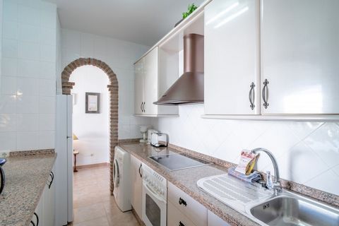 An elegant apartment in the heart of Nerja, this holiday home offers a comfortable stay for up to four guests, with one double bed and two single beds across two spacious bedrooms. It is not pet-friendly but is ideal for families or small groups. Gue...