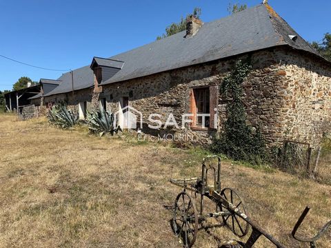 Cette spacieuse maison avec une longère à restaurer.
