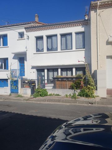 Maison de ville proche commerce et plage
