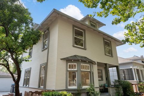 Welcome to your new home in San Jose's coveted Naglee Park neighborhood! This charming 1912 Victorian Foursquare home offers a timeless blend of historic elegance and modern living. As you enter from the covered porch into the formal entry, you're gr...