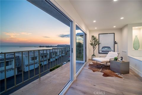 Crowning one of the highest points within the sought-after Dana Bluffs enclave, this newly remodeled townhome offers the ideal combination of luxury living and panoramic ocean views. Open, bright and fashionable, the residence’s contemporary style is...