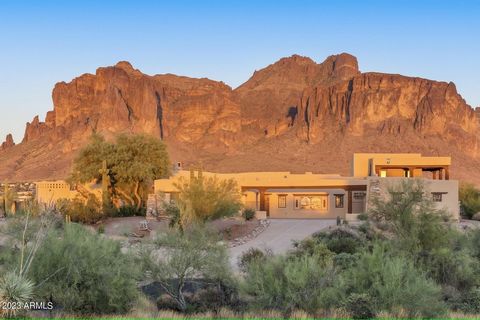 A stunning truly custom home on 7+ acres of horse property with the breathtaking views and unlimited trails of the Superstition Mtn Wilderness area. Gorgeous Santa Fe styling with custom high architectural ceilings, varieties of door designs, custom ...