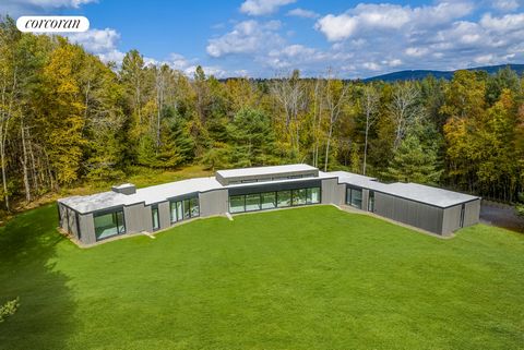 Private country setting, contemporary design and net zero energy stewardship all come together in a serene landscape setting with beautiful views of Catamount Mountain. Enter along a stone drive that winds its way to a single story, 3500 SF, stained ...