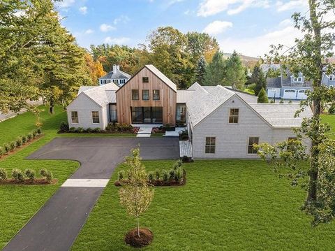 xperience the warmth of home in this exquisite New England Contemporary residence, artfully crafted on a sprawling 43,998 sq ft lot. Boasting 10 rooms, 5 bedrooms, and 6.5 baths, this 5129 sq ft masterpiece spans 3 floors and includes a 3-car garage....