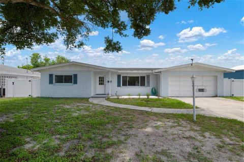 A home you really have to see to believe, with a new price! This home is located off of 26th St W on almost a 1/2 acre with a brand new workshop. The Home is a 3/2 with a good size Florida room and a 2 car garage. The Home has had many upgrades in th...