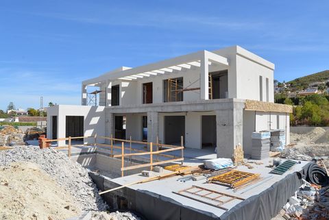 Modern south facing villa under construction with beautiful views over the landscape in Javea. This beautiful modern villa is currently under construction and will be finished July 2024. This south facing villa is located in one of the popular areas ...