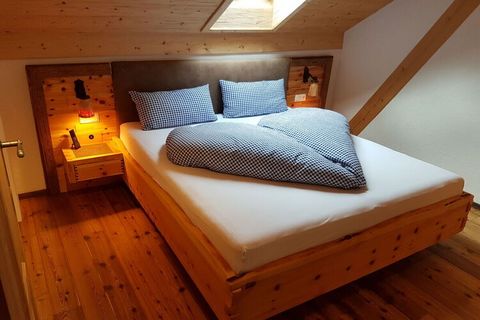 Our chalet-style Waidlersuite holiday apartment can accommodate 4 people. The processed solid wood makes this apartment warm and cozy. You can expect a modern bathroom with shower and toilet, a pine bedroom, an oak bedroom, a fully equipped kitchen m...