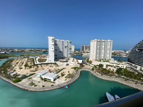 Geweldige verkoopkans! Dit spectaculaire condominium op de 12e verdieping van een luxueus wooncomplex in Puerto Cancun biedt een adembenemend uitzicht op de oceaan. Het is volledig gemeubileerd en beschikt over een ruim terras met een panoramisch uit...