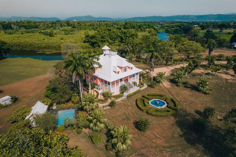 This is a one-of-a-kind residential estate set along the Sittee River just south of Hopkins Village and north of Placencia, Stann Creek District, Belize. This private estate is set on 8.88 acres with approximately 283 feet of gorgeous Sittee River fr...