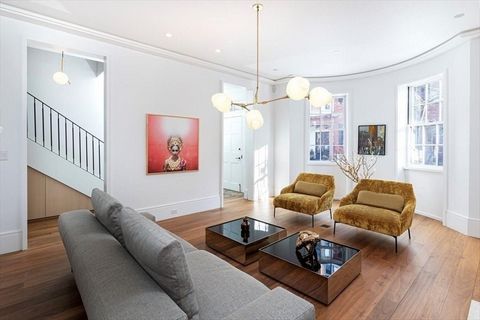 Exquisitely marrying historic Beacon Hill character with contemporary design, this 2017 gut renovated 4 bedroom + 2 office townhouse has been thoughtfully designed and expertly crafted! 6 levels of living connected by an elegantly draping oval stairc...